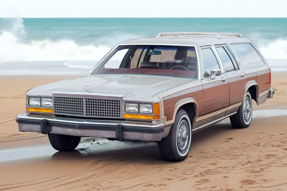 Ford Country Squire Station Wagon At The Beach